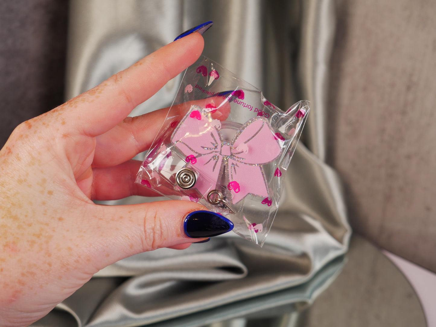 House of Glam Boutique - Bow Badge Reel