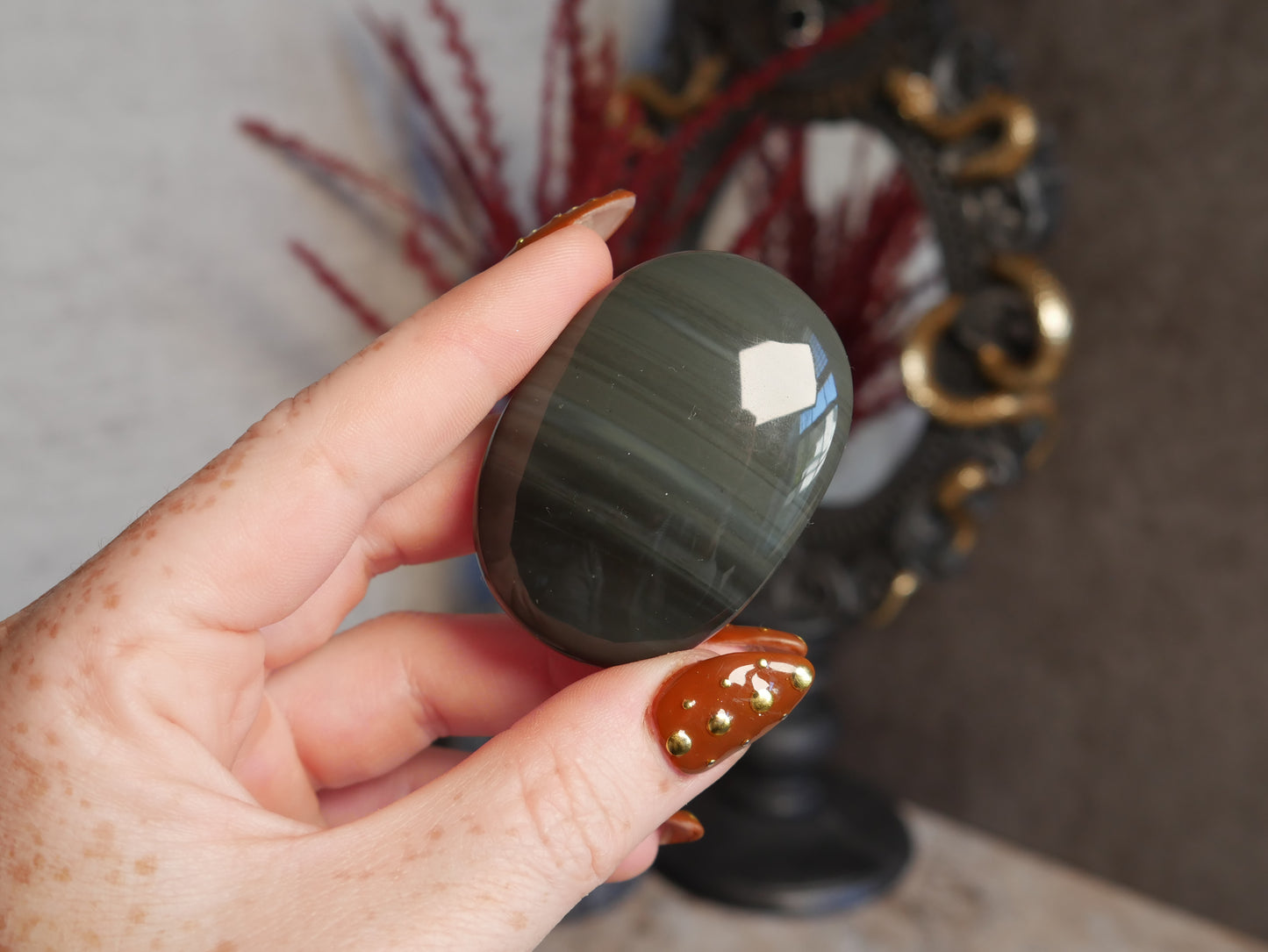 Platinum Obsidian Palm Stone