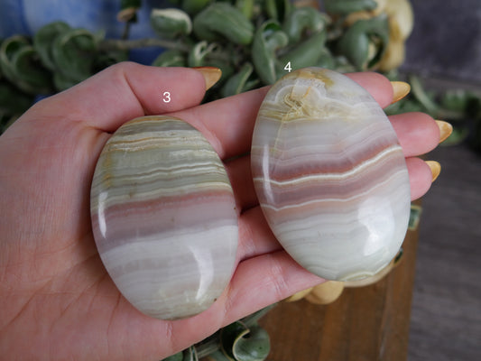 Pink Banded Onyx Palm Stones [various]